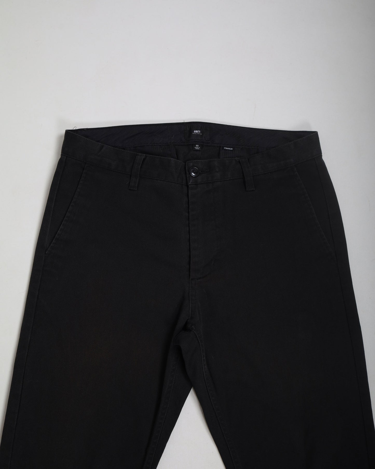 Obey tapered straggler trousers