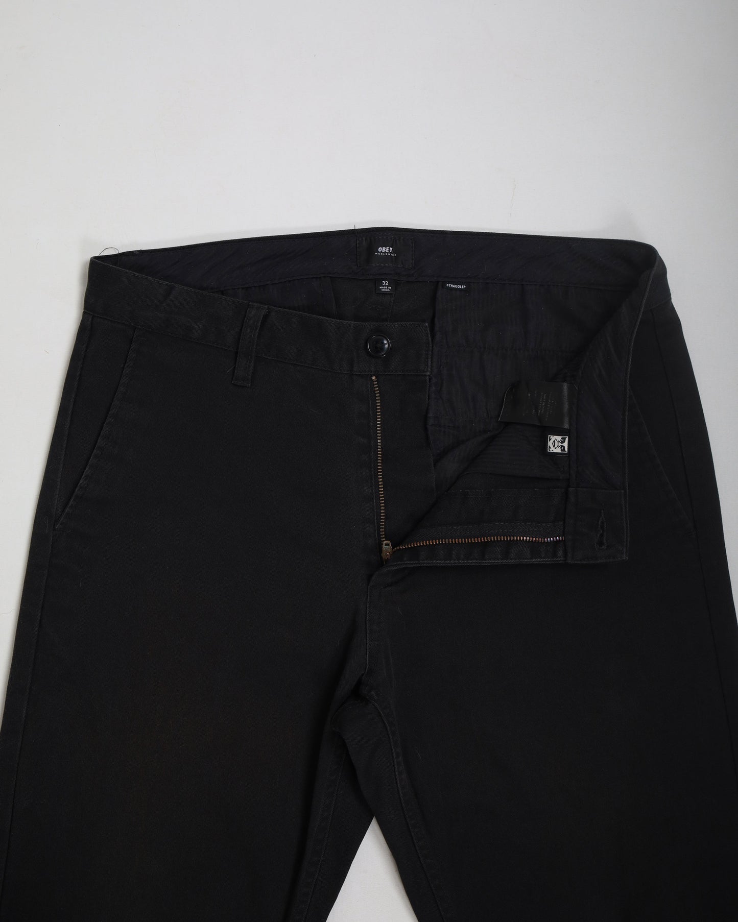 Obey tapered straggler trousers