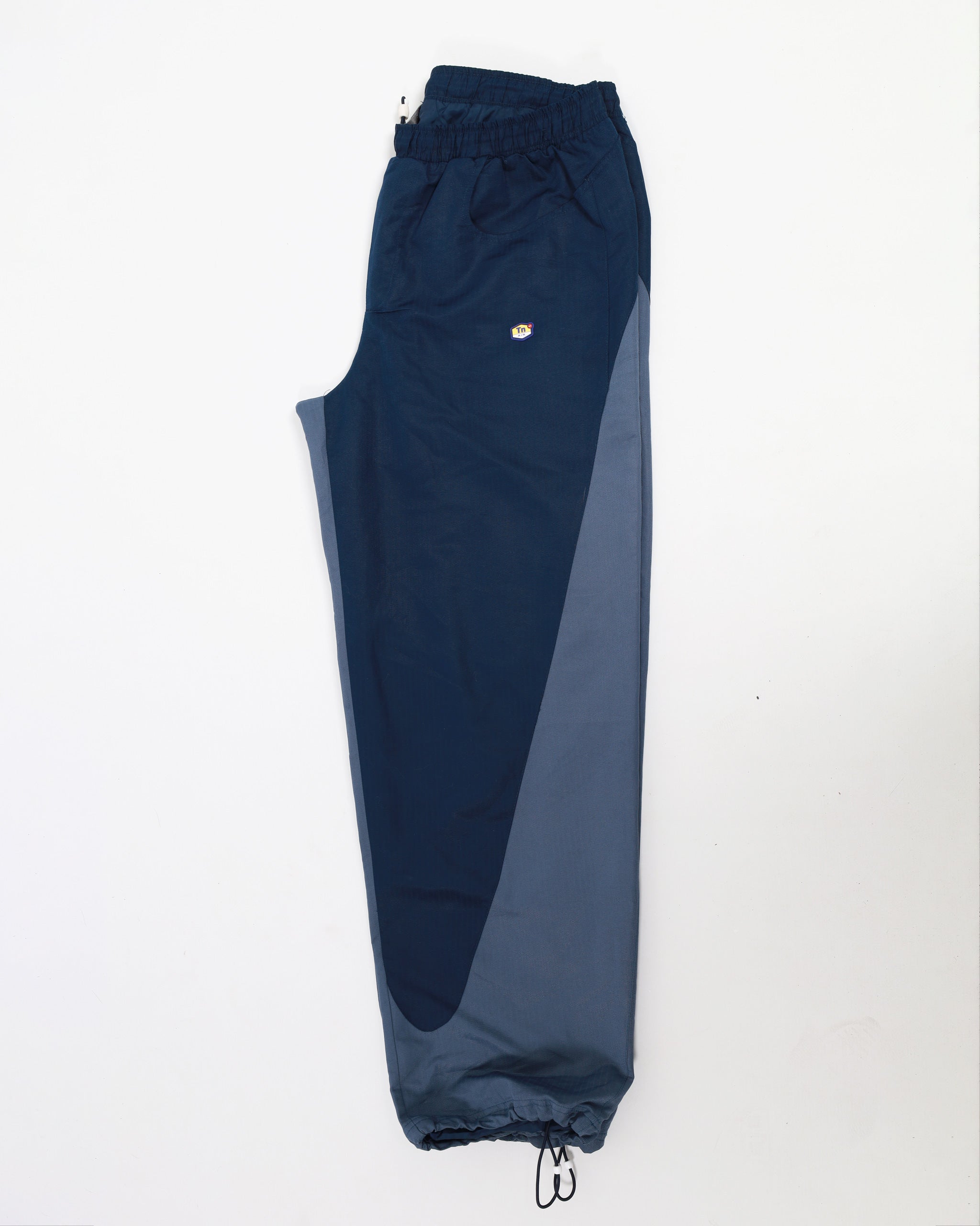 Nike tuned air track pants hot sale